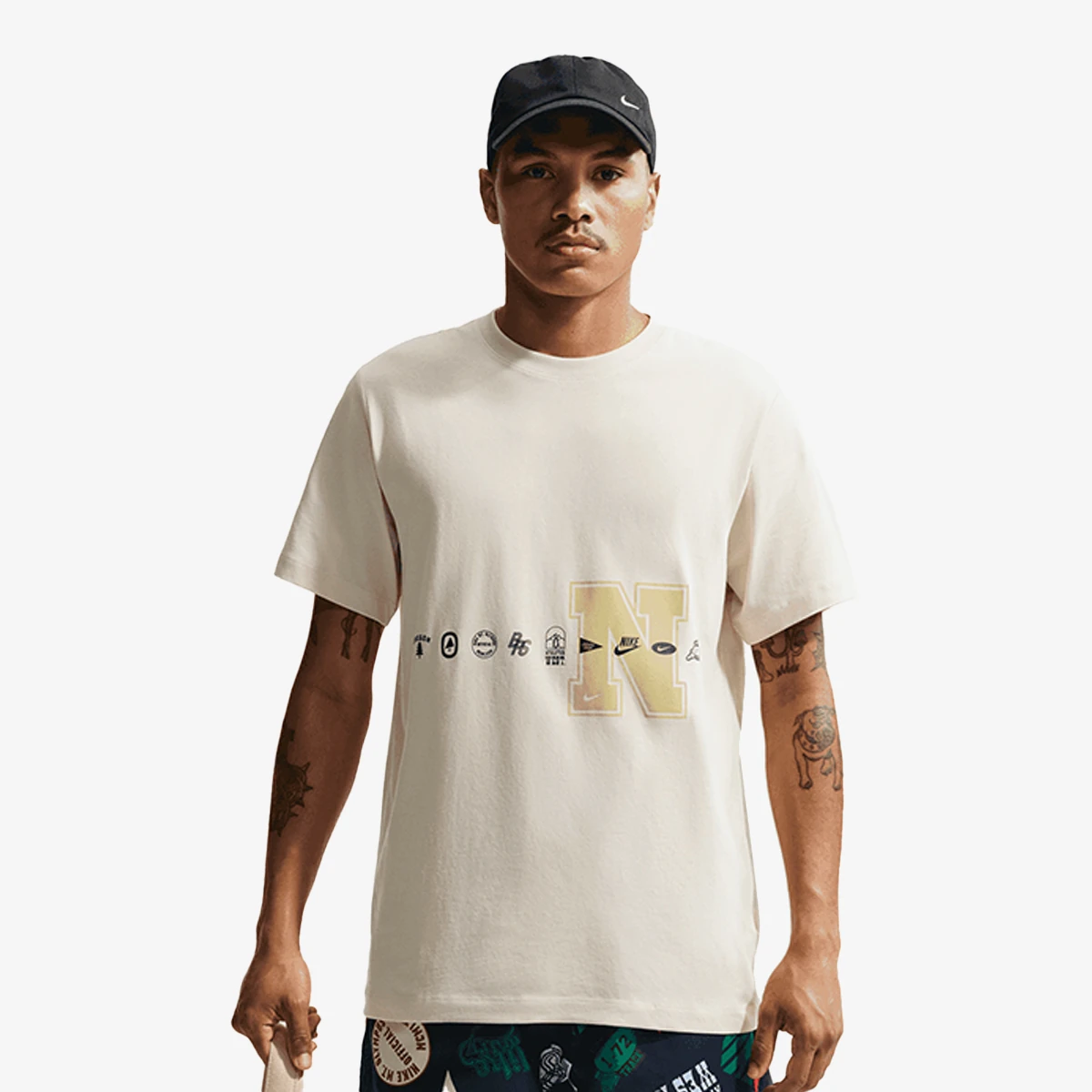 U NSW TEE STD CELEBRATE BRAND